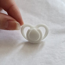 Miniature dummy/pacifier for silicone dolls