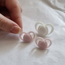 Miniature dummy/pacifier for silicone dolls