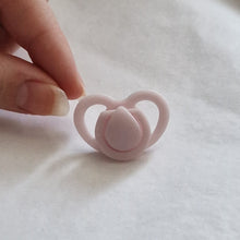 Miniature dummy/pacifier for silicone dolls