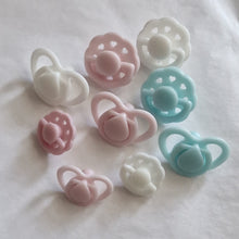 Miniature dummy/pacifier for silicone dolls
