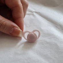Miniature dummy/pacifier for silicone dolls